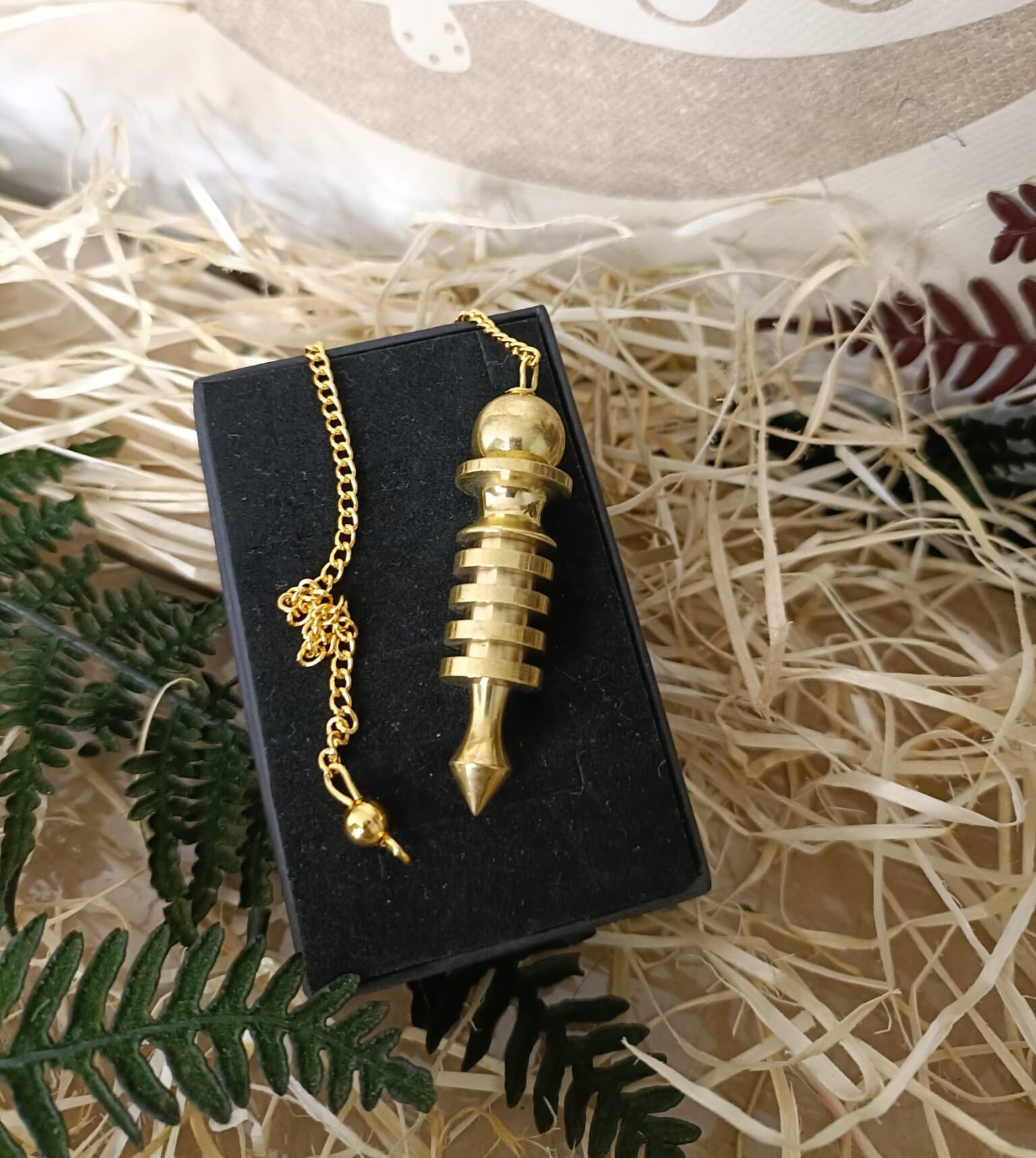 Péndulo Isis de Metal con Cavidad para Testigo