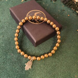 Pulsera Pirita 6 mm con Mano de Fátima